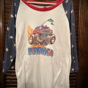 Ringer jersey style cartooned graphic 3/4 sleeve shirt